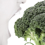 Person eating broccoli to represent disordered eating