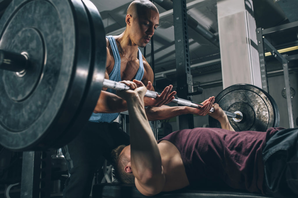 Strength training with a spotter