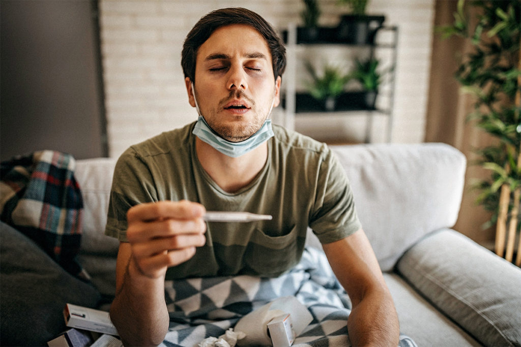 Man feeling sick and maybe showing early symptoms of infection