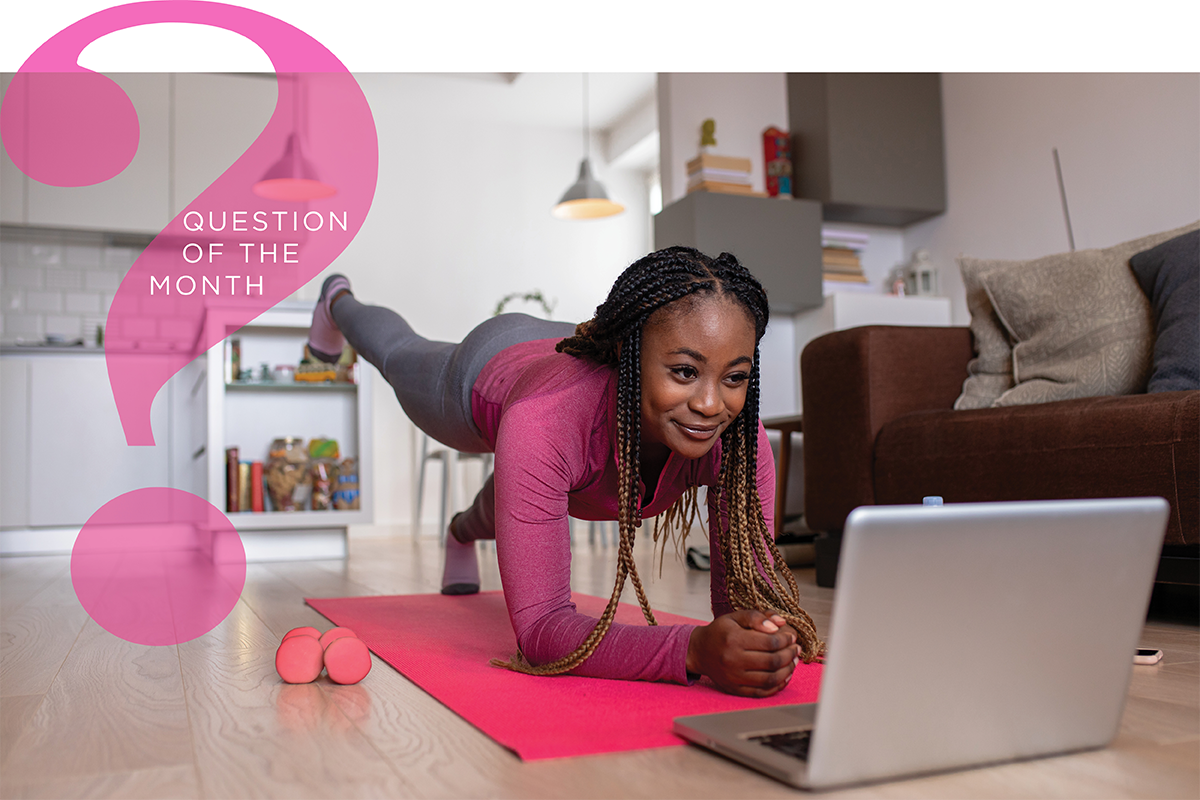 Woman exercising and using online fitness platforms