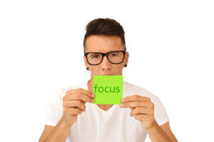 Man holding a piece of paper with the word "focus" written on it for organizational efficiency