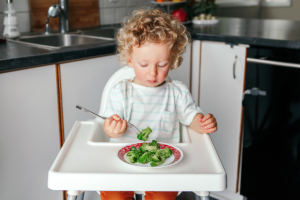 A child eating vegetables