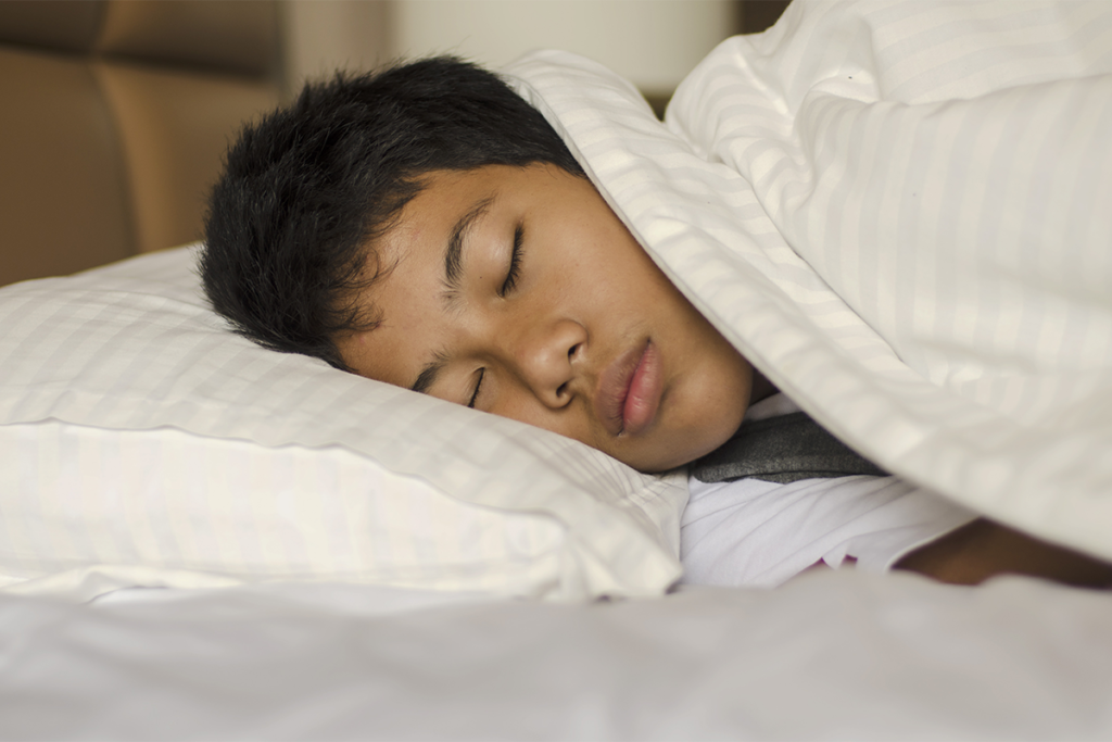 A man sleeping to represent social jet lag