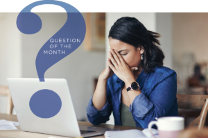 A woman stressed out in front of her computer