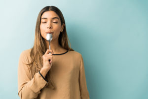 Woman savoring food and not eating fast