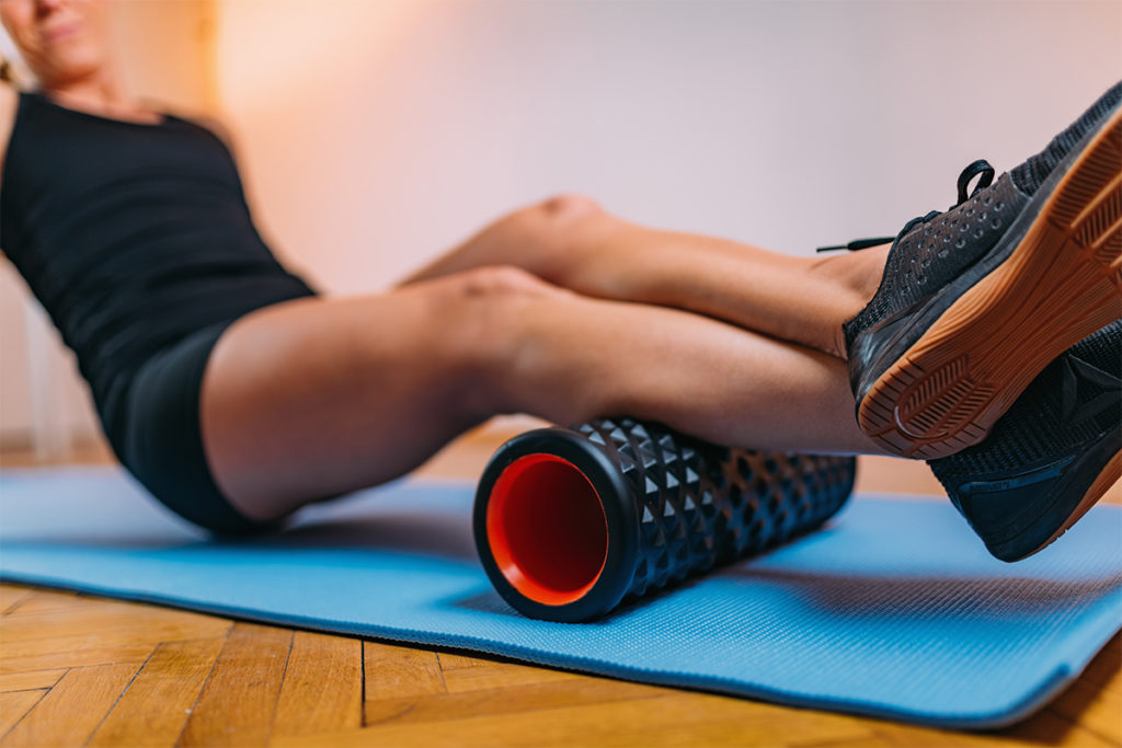 A person foam rolling for range of motion