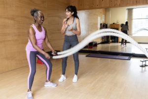 Woman exercising for HIIT benefits