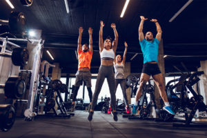 Group of people doing HIIT in a gym