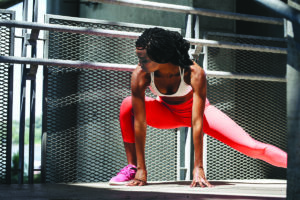 woman stretching as movement preparation