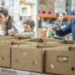People boxing food to prevent food insecurity