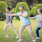 Older adults practicing tai chi for weight loss