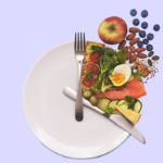 Food plate arrange like a clock to illustrate intermittent fasting