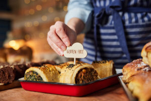 Person labeling gluten-free diet food