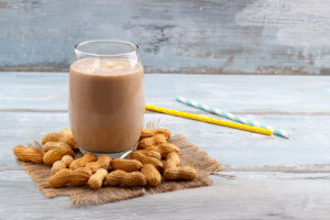 Glass of peanut protein shake