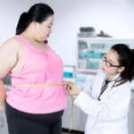 Obese patient with doctor