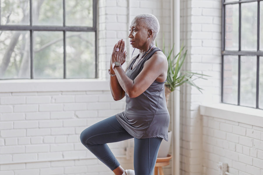 Woman doing yoga for older adults