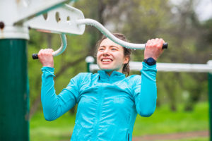 Young girl exercising as training for youth