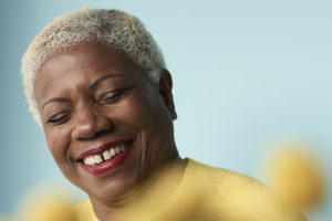 Woman smiling to show uncovering your purpose
