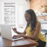 Woman reading online nutrition labels
