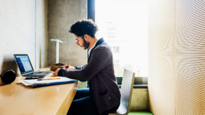 Adult learner on computer