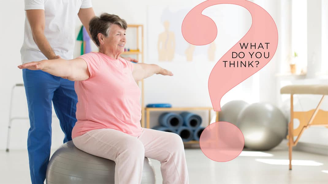 Trainer helping older woman with balance for longevity