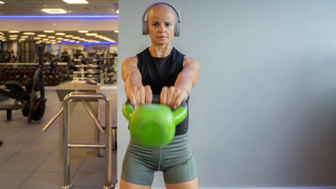 Breast cancer survivor doing strength training