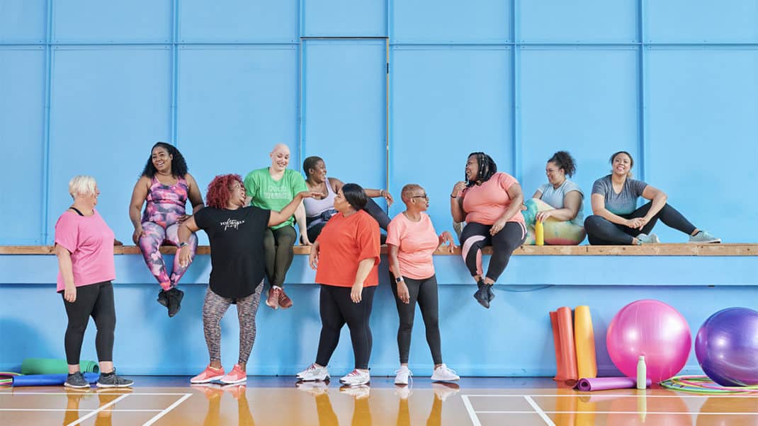 People building community in fitness class