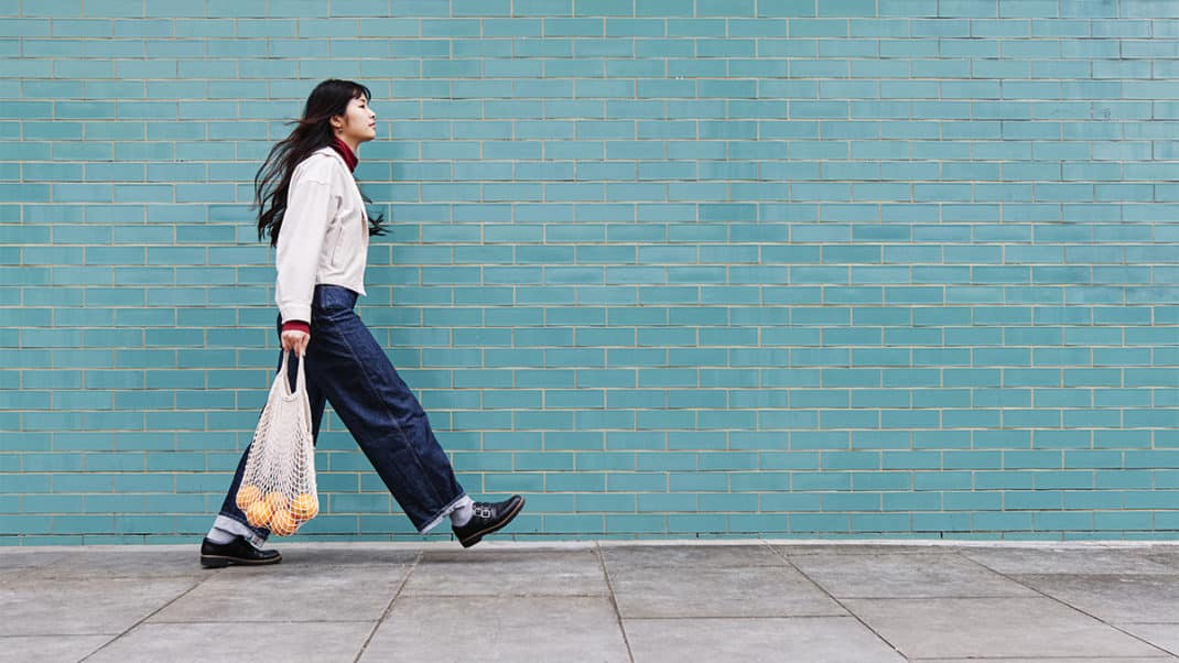 Woman walking to show low physical activity levels