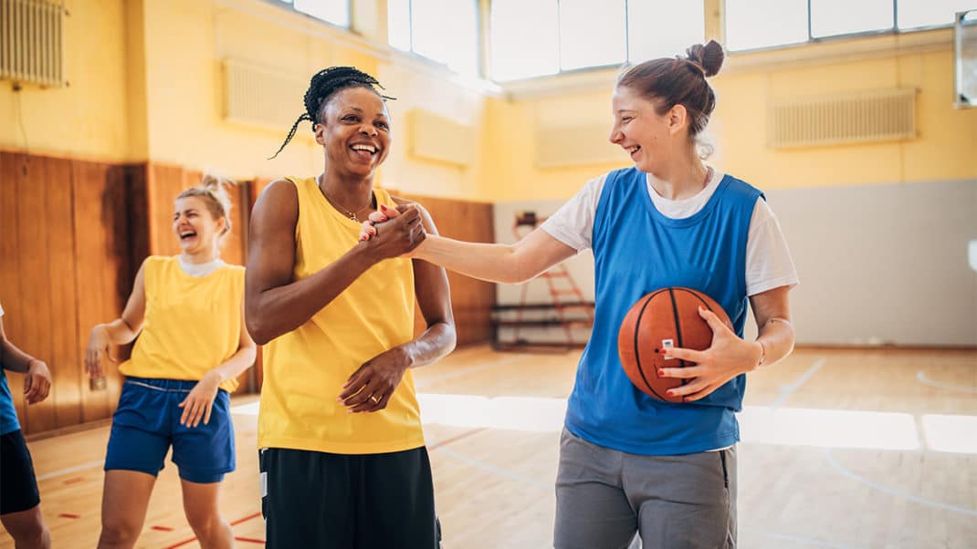 Two female athletes showing grit in sports training