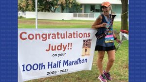 Judy after 100th half-marathon
