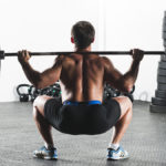 Man showing squat biomechanics