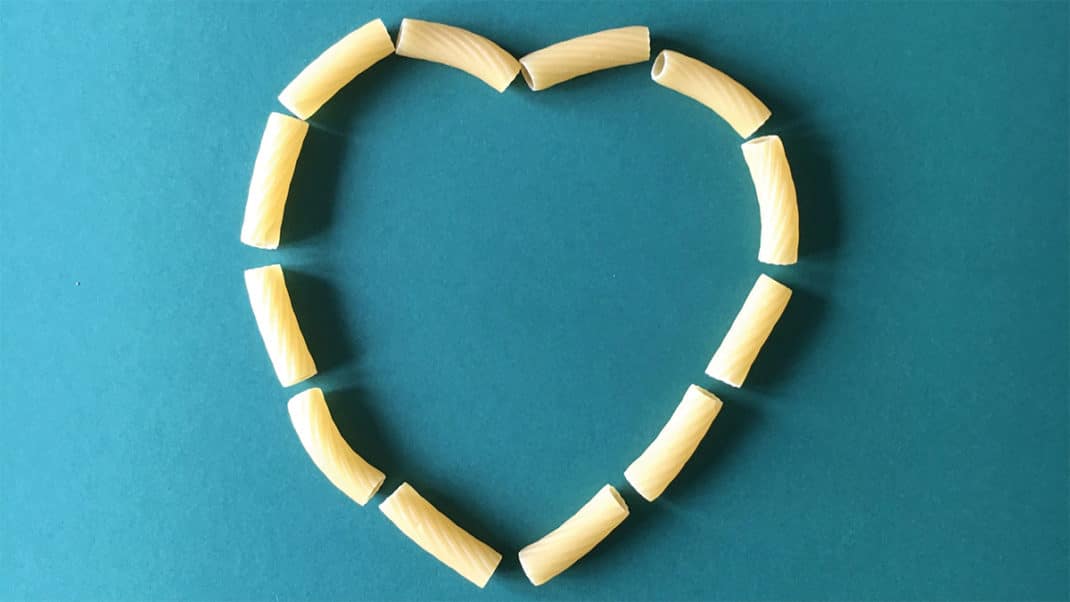 Heart made from macaroni to show carbs and dieting