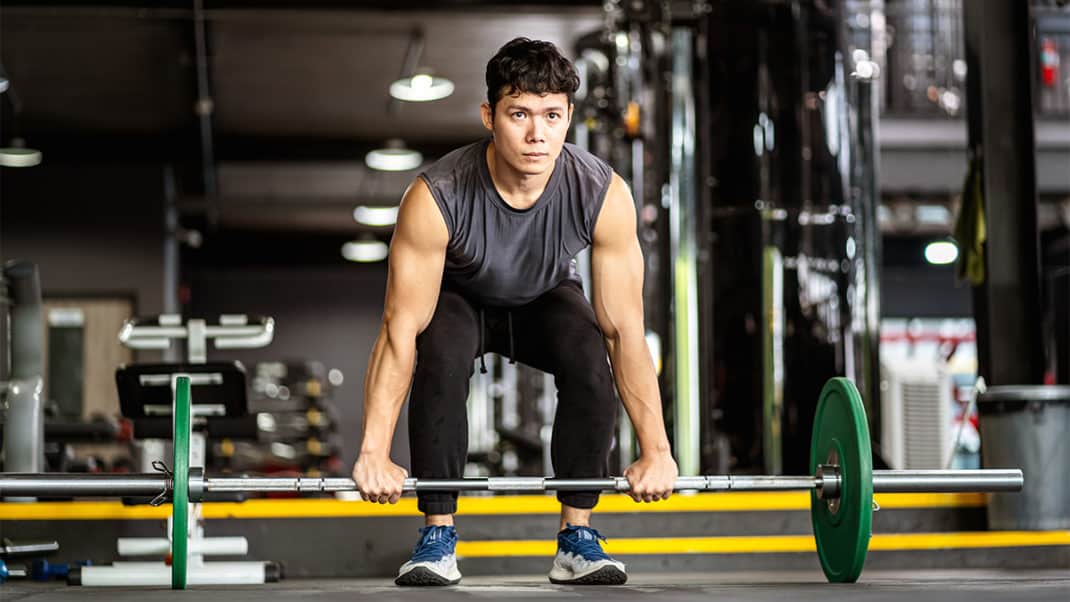 Man weightlifting to achieve flow state