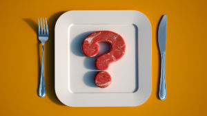 Meat in the shape of a question mark to represent antibiotics in food
