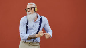 Older man dancing to low-frequency bass music