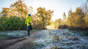Person doing morning exercise outside