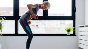 Older woman doing exercise for osteoporosis