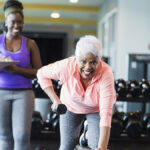 Trainer and client using free-weight training
