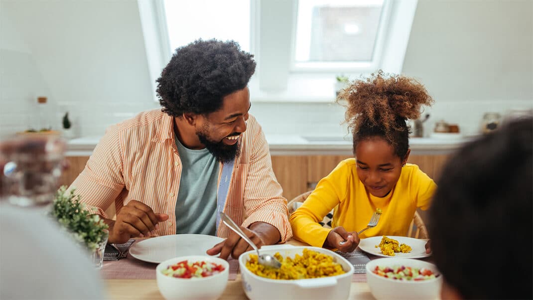 Father and daughter sharing family meals